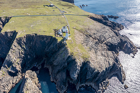 爱尔兰Donegal县Arranmore岛灯塔的空中景象支撑岩石旅游悬崖海岸线地标天线波浪旅行土地图片