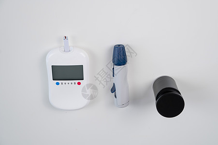 家庭血糖测试包 液压计 脱衣笔 针头和文字条监视器诊断控制疾病仪表检查药品乐器葡萄糖监视图片