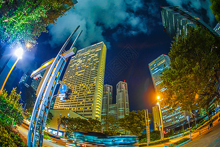 东京新宿高层建筑群的夜景之景城市工作夜空绿色高层建筑群街景蓝天建筑摩天大楼景观图片