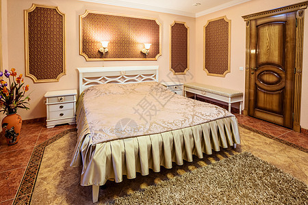 现代卧室的装饰和家具照片灯光天花板内阁公寓大厦打印风格木地板木头图片