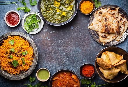 真实的印度菜和零食香料自助餐午餐菜单空白派对街道送货草本植物盘子图片