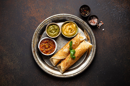传统印第安人多萨午餐肉汁水鹿餐厅咖啡店盘子桌子蔬菜胡椒油炸图片