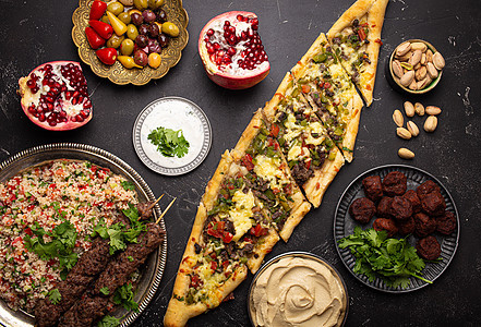 阿拉伯土耳其族从上方排列的各类食物开心果自助餐桌子腌菜馅饼豆泥鹰嘴派对美食火鸡图片