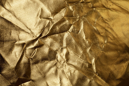金金质条 闪亮和折叠的金色背景摘要反射划痕工业高光金属崎岖墙纸黄色奢华空白图片