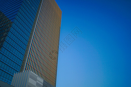 玉宫大厦 日落照耀着它景观商业摩天大楼铁路城市港区建筑群办公楼建筑天空图片