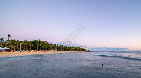 奥胡哈瓦伊省Waikiki海滩地区日落城市波浪粉色多云海洋热带红色摄影照片建筑物图片