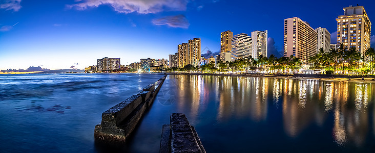 奥胡哈瓦伊省Waikiki海滩地区日落天空多云波浪码头粉色热带海洋城市摄影照片图片