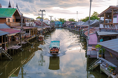 泰国阿姆法瓦旅游景点的阿姆法瓦浮动市场和泰海文化食物贸易日落商业游客旅行天空购物村庄热带图片