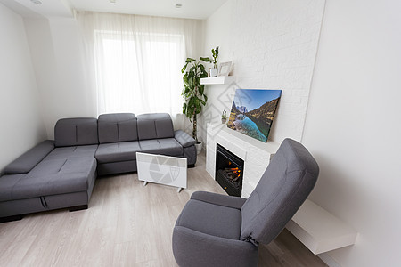 现代电热器在室内时尚房间地毯空气地面加热经济温度活力散热器温暖气候图片
