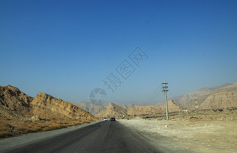 通往Jebael Jais山的公路山脉沥青蓝色车辆天空标记马角顶峰旅行冒险图片