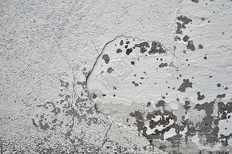 空旧的抹灰墙纹理 涂漆有问题的墙面 破旧的建筑立面 石膏损坏砖墙划痕墙纸灰色白色破坏水泥风化图片