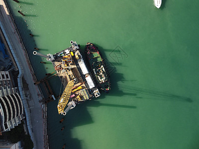 建造码头的浮起吊船疏疏浚驳船 空中最高风景港口海洋运输血管漂浮物蓝色驳船海岸工作技术图片