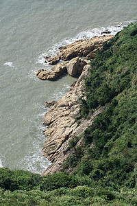 海边的旋翼和岩石 照片来自浙江太州泰州崎岖浪花海岸线砂岩石头海景海岸海洋渲染支撑图片