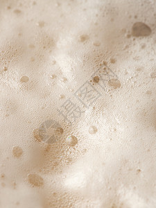 啤酒泡沫顶视图 淡啤酒上的柔软新鲜泡沫 泡沫啤酒 啤酒泡沫纹理背景液体酒吧草稿宏观小麦酒精牛皮纸派对玻璃饮料图片