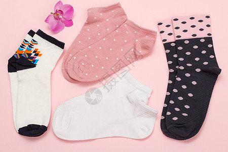 粉红色背景的女人袜子 最佳视野服装兰花团体灵活性短袜衣服羊毛纹理纺织品针织品图片