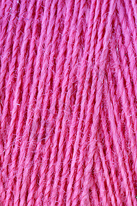 红棉线在波宾的宏观纹理 特写 复制空间材料衣服框架产品卷轴针织羊毛线圈编织棉布图片