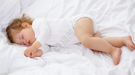 宝宝需要好好睡一觉 一个可爱的孩子睡在卧室里图片