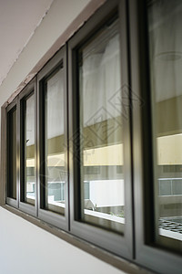 现代建筑 配有有色玻璃的窗户商业房子调子中心财产建筑学办公室城市住宅几何图片