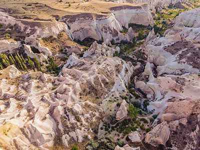 谷 土耳其卡帕多西亚 前往土耳其的概念冒险远足火鸡旅游火山砂岩公园日落岩石爬坡图片