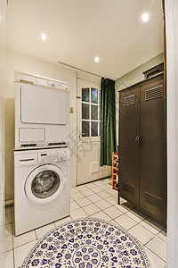 洗衣房的洗衣机和烘干机风格器具厨房家具建筑学白色地面公寓窗户房间图片