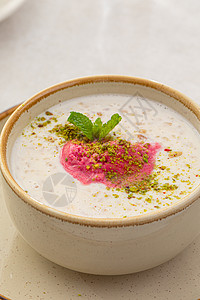混合麦片粥加果汁汤稀饭咖啡店早餐摄影甜点餐厅桌子菜单粮食牛奶图片