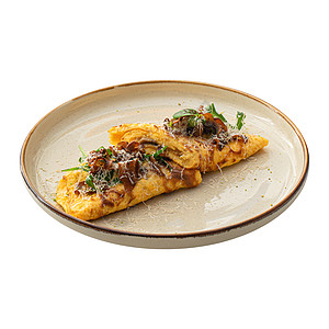 配蘑菇和奶酪的煎蛋卷饼草药油炸绿色营养桌子食物早餐午餐盘子美食背景图片