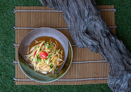 泰国番茄辣色沙拉 或瓷器盘上叫豆子沙拉早餐美食餐厅味道草本植物陶瓷饮食柠檬热带辣椒图片