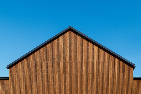 屋顶的表面装饰 用天然木板搭配新现代房子 复制空间的自然木板背景图片