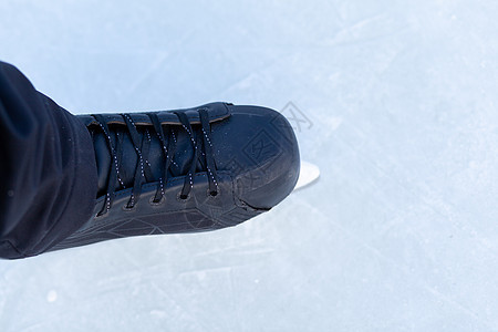冰冻冰上贴着鞋带的冰滑冰鞋运动冻结溜冰者刀刃痕迹数字闲暇乐趣竞技场曲棍球图片