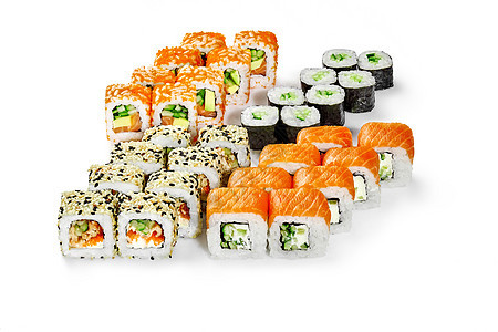 一套日本寿司卷 配有鲑鱼 鱼 托比科和白色蔬菜的日本寿司卷图片