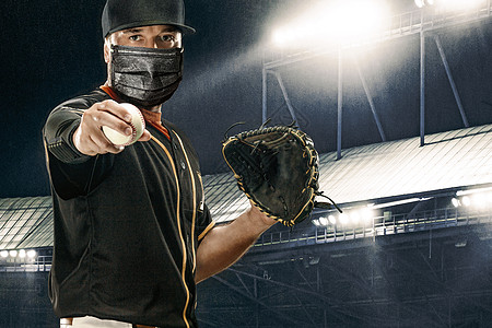 戴着医用面具的职业棒球运动员 2020 年的棒球比赛冠状病毒大流行时期 球场上的棒球运动员在行动棒球帽娱乐训练竞技场男人运动旋转图片