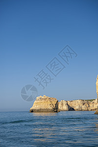 阿尔加维海岸的岩层海岸线石头编队岩石风景天空假期旅行旅游蓝色图片