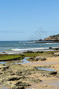 阿尔布费拉的普拉亚玛丽亚路易萨蓝色岩石旅行旅游海景海滩石头海洋风景砂岩图片