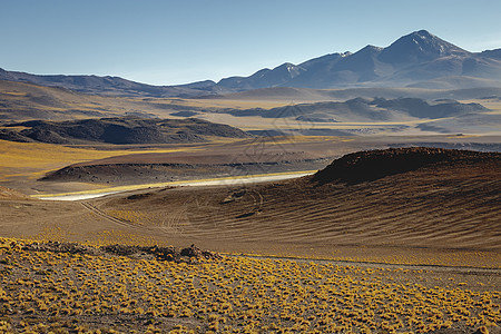 智利阿塔卡马沙漠Sunset月光谷泥土路地貌戏剧性地貌高原旅行目的地小路乡村冒险勘探山脉公路火山图片