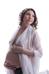 穿轻织物的美丽的孕妇背景图片