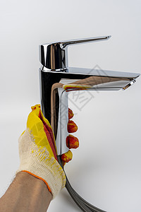 白色背景上闪亮的新水槽龙头 Sink 混音器喷雾器软管卫生管道替代品房子阀门混合器安装卫生间图片