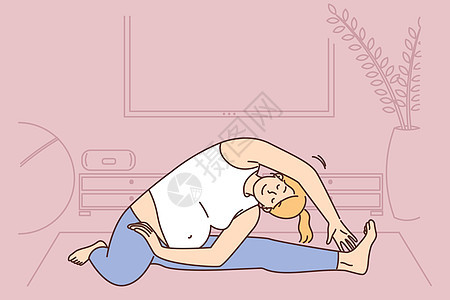 怀孕妇女在家里做瑜伽图片