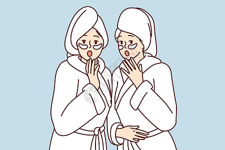 身着白色浴袍 湿毛巾的惊吓妇女 张开嘴时戴着毛巾图片