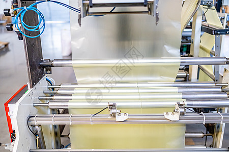 工厂生产塑料袋的厂家机器工具输送带加工力量运动自动化包装商业控制图片