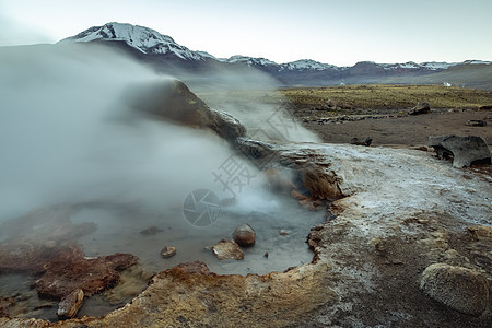 日出时有河流和火山风景的智利阿塔卡马绿洲景观橙子高原摄影喷泉沙漠风景公共公园旅游图片