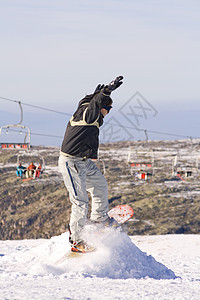 跳跳雪板天空夹克单板蓝色乐趣季节青少年运动木板滑雪者图片