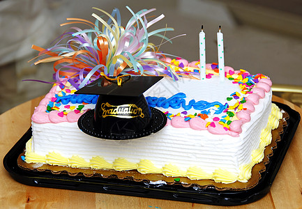 脱离蛋糕学校帽子派对乐趣成就蜡烛教育生日庆典食物图片