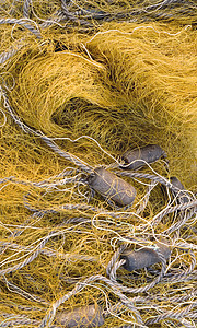 渔网捕鱼网黄色细绳浮标纺织品渔夫商业网络屏幕工作绳索图片