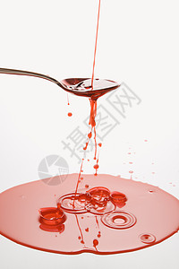 勺子和喷洒药药物餐具测量卫生保健红色茶匙药品水坑剂量图片