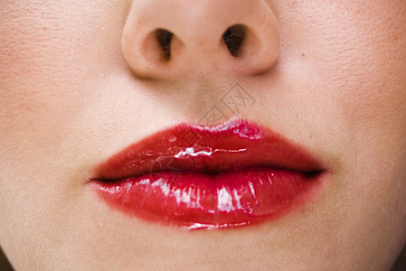 红色嘴唇女孩鼻子化妆品女士男性女性光泽度背景图片
