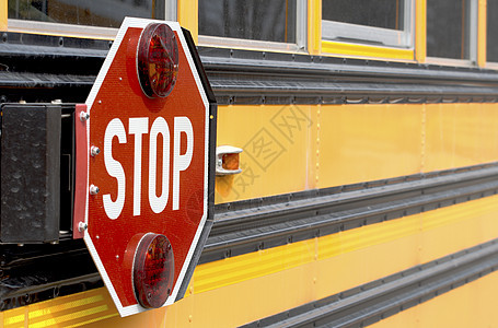 停止路线巴士黄色送货乘客过境信号车辆孩子青年图片