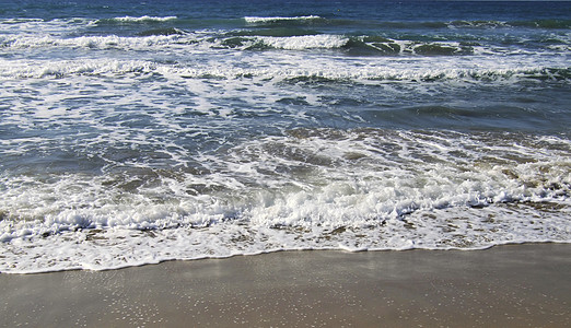 浮度碰撞支撑风景泡沫假期场景波纹海洋明信片海滩图片