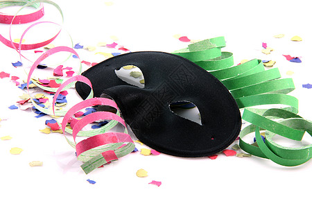 黑面罩和派对嘉年华眼睛乐趣彩虹丝带圆圈狂欢节纸屑周年喜悦图片
