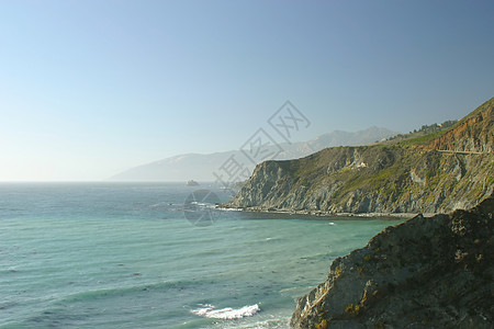 大南瀑布岩石海洋海拔蓝色波浪顶峰海岸麦威爬坡图片