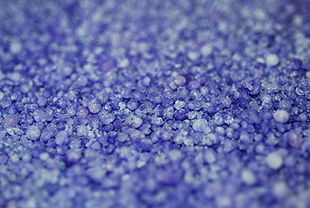 蓝粉背景粒子紫色粉末颗粒剂颗粒宏观艺术粮食图片